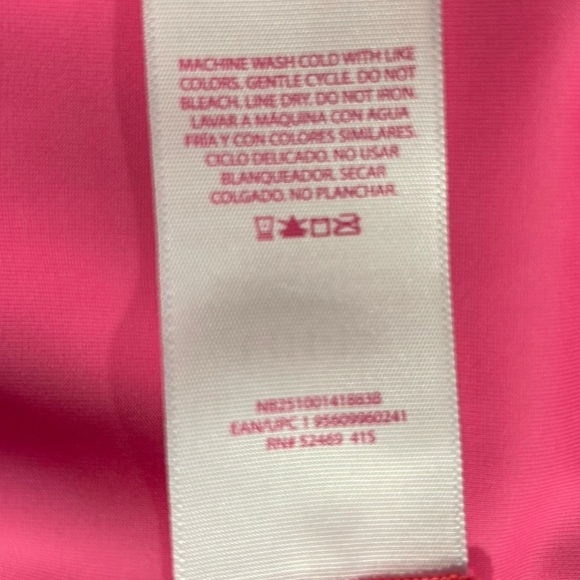 A No Boundries bikini that is reversible and can be pink or purple or a combo - Picture 6 of 10